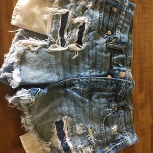 High rise distressed medium wash AE cut offs